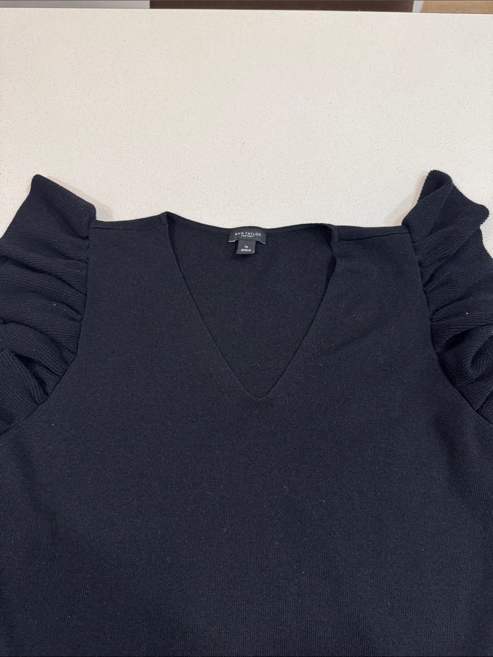 Ann Taylor Black V-Neck Knit Top with Ruffled Cap Sleeves